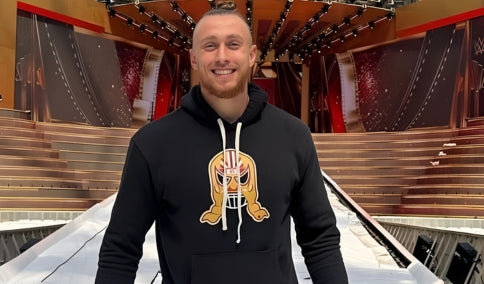 George Kittle wearing BreakingT apparel